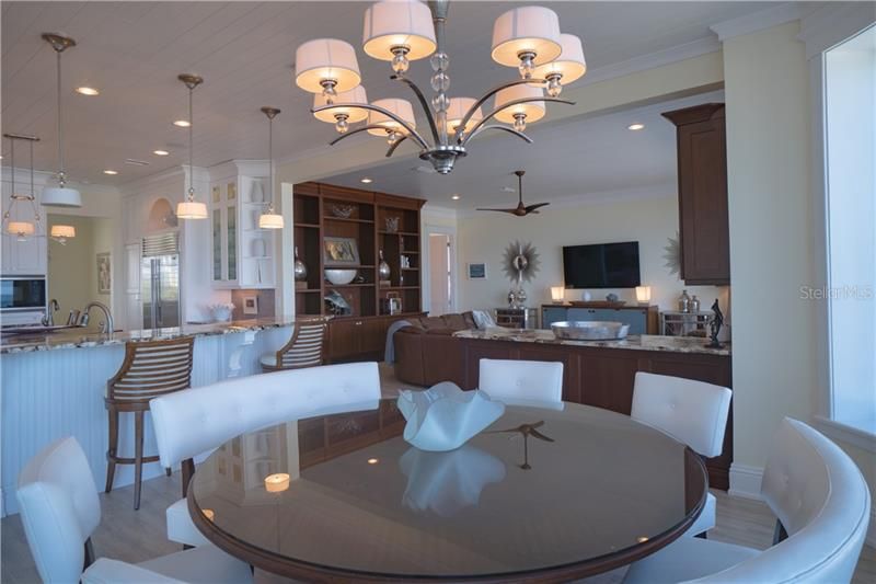 Elegant coastal living, open concept with a monotone color scheme enhancing this sophisticated yet relaxed interior.