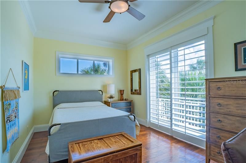 (Elevator or stair access) to bedroom #2, private balcony, golf view, Plantation shutters.