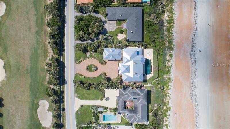 Aerial view, ocean in the back,  Ocean view country club for golf in the front! This is Coastal living at it's finest.