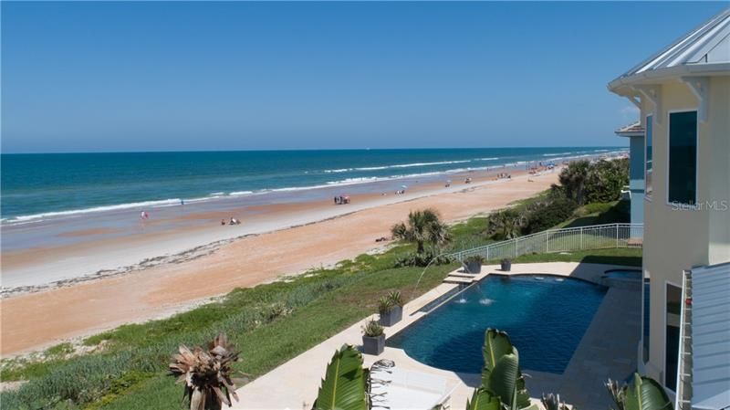 Private infinity pool with spa and sun deck.  Picture taken on a Saturday, although the beach is public- it feels private. Private access to the beach located at the white iron fence.