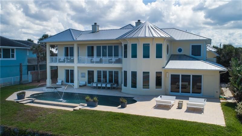 Private infinity pool with spa and sun deck, upper balcony, lower covered patio. Coastal living at it's finest!