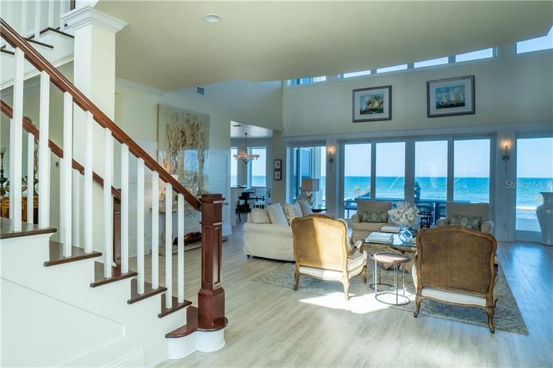 Formal Living, ocean views upper and lower windows, High impact windows and sliding doors exquisite stair case, Elevator not shown.