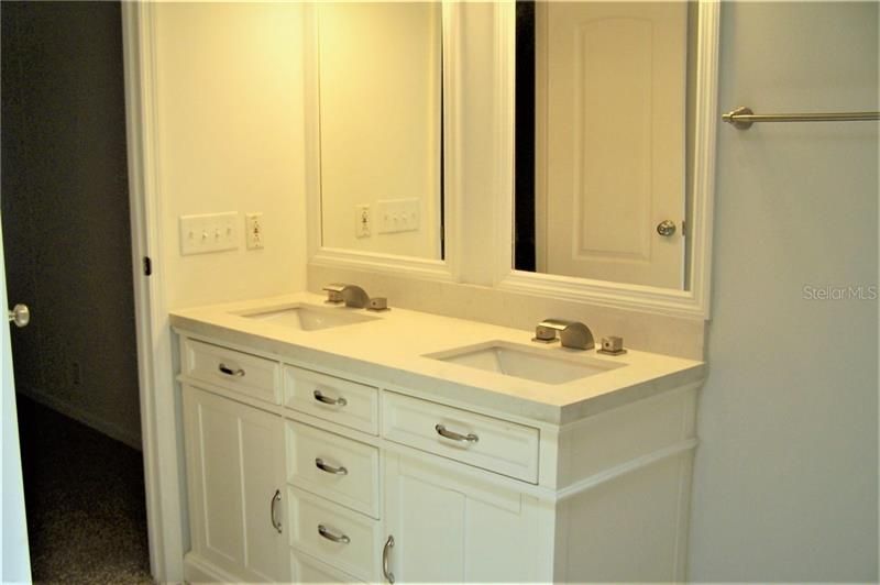 Double sink with water fall faucets