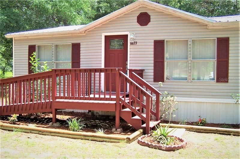 Option of stairs on right of front deck.