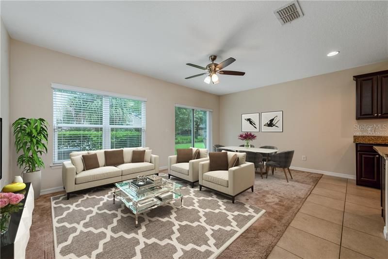 A light and bright OPEN CONCEPT floor plan is ready and waiting for you to move right in and make it home! Virtually Staged.