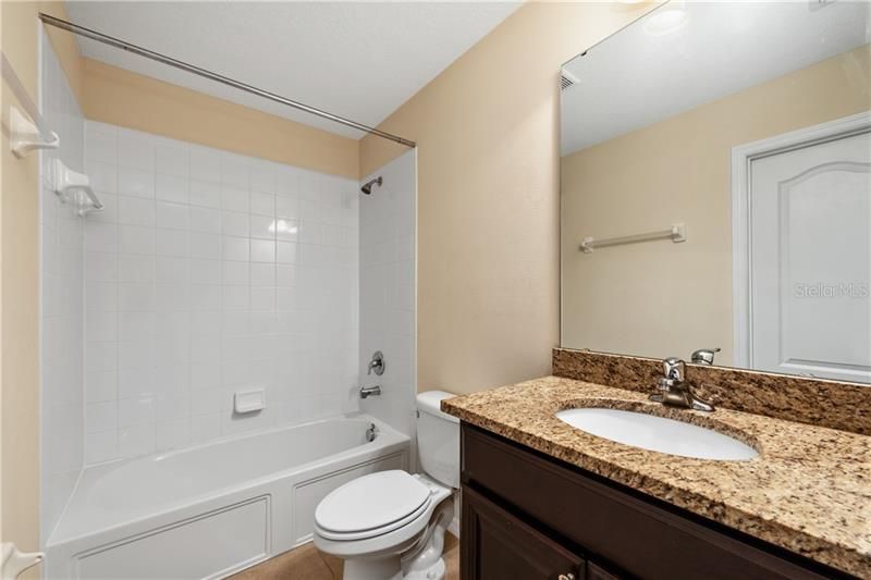 PRIMARY EN-SUITE BATH features a WALK IN CLOSET and this one has a soaking TUB/SHOWER!