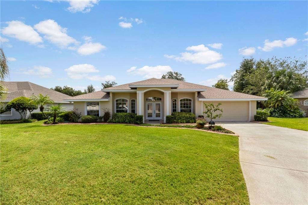 FRONT ELEVATION with long driveway for extra parking!