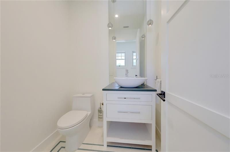 This water closet and wash basin offers added privacy to the Jack and Jill bedrooms