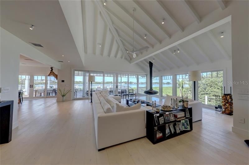Upon entry, you will find the living room which offers modern luxury, timeless sophistication and sweeping water views!