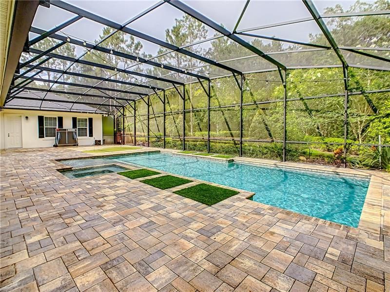 POOL AREA WITH CHIPPING GREEN AND SO MUCH ROOM TO ENTERTAIN.
