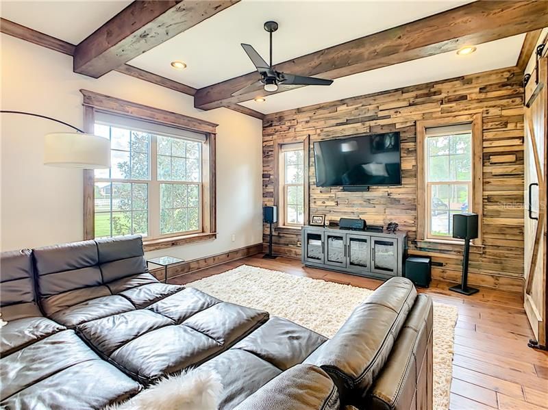 THIS COZY ROOM IS OFF THE SITTING AREA WITH WOOD BEAMS, WOODEN WALL AND WOOD BARN DOORS.. SUCH A PEACEFUL SPACE.