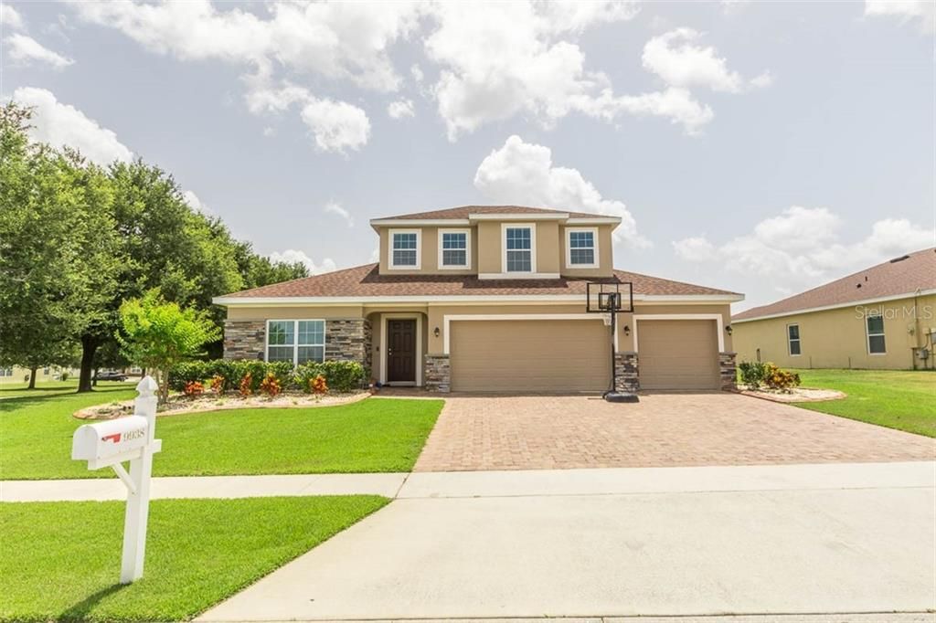 Exterior Front view with 3 car garage