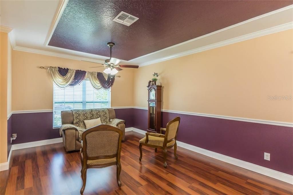 Formal Living Room with window looking out to front yard