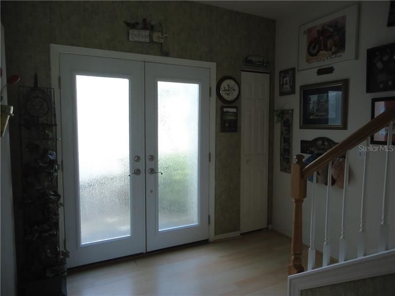 View from foyer to double doors.