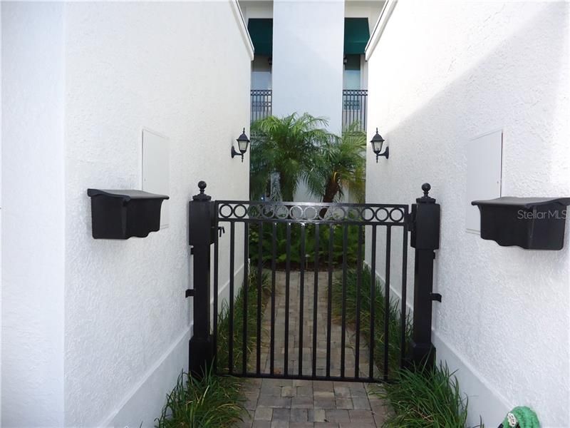 Gated entry into courtyard