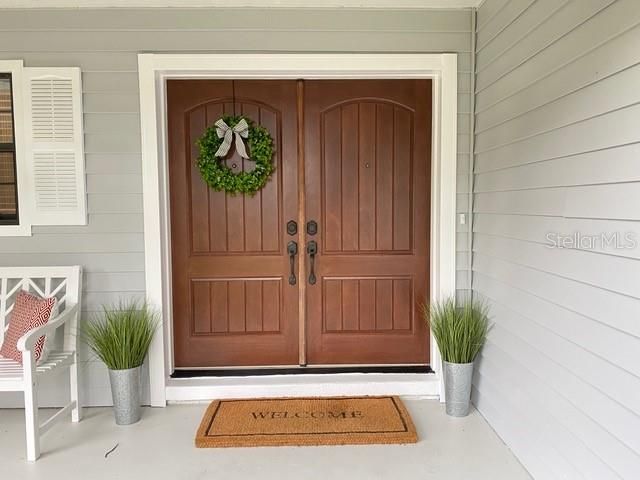 Double welcoming entry doors.