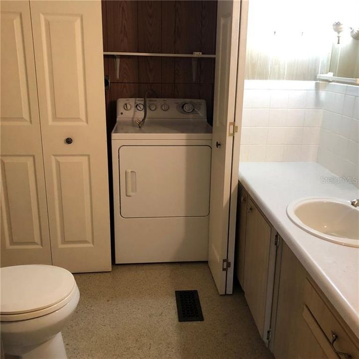 Half Bath & Laundry Area