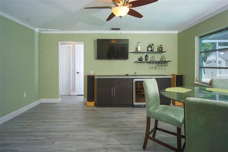 FAMILY ROOM WITH BUILT-IN BAR AND WINE COOLER