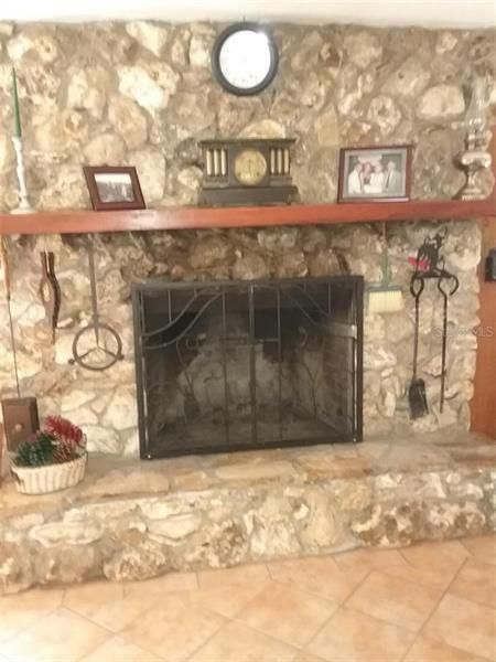 Enjoy the Warmth from the Stone Fireplace on those Cool Winter Evenings.