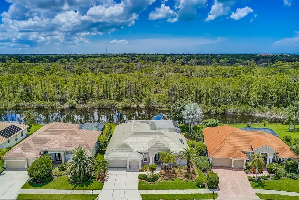 Waterfront with peaceful backdrop of Oscar Scherer State Park!