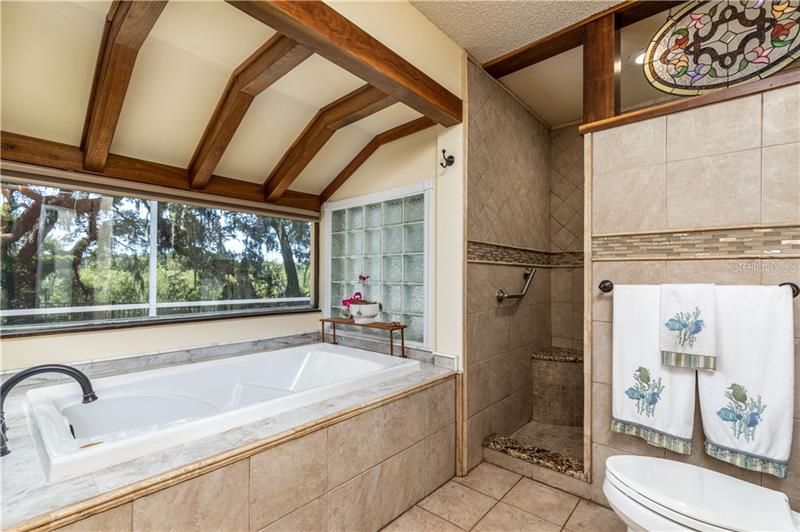 Master garden tub with lakeside view-separate shower