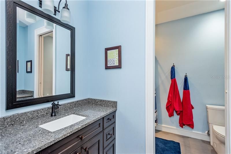 Hall bath with dual vanities and sinks.  Door can be shut to tub and toliet.