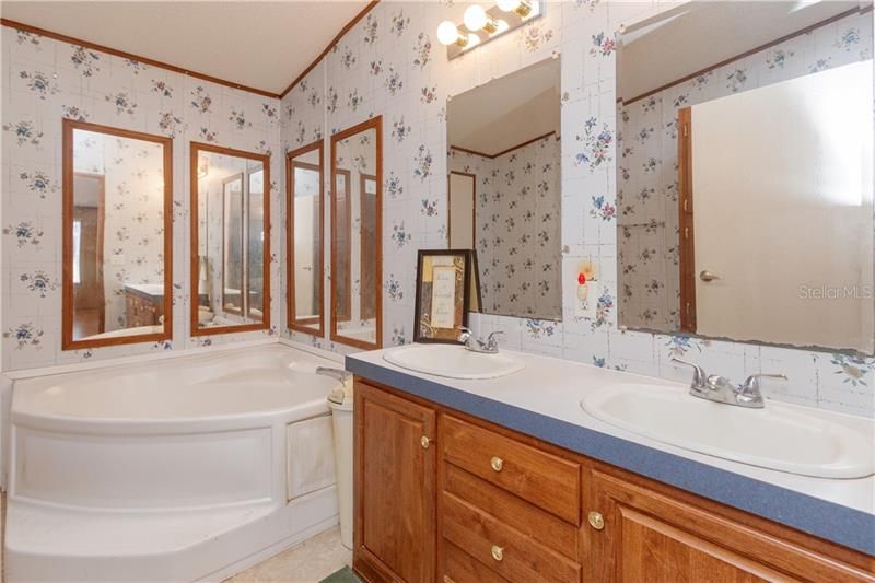 Master Bath with garden tub. Also has a separate walk in shower