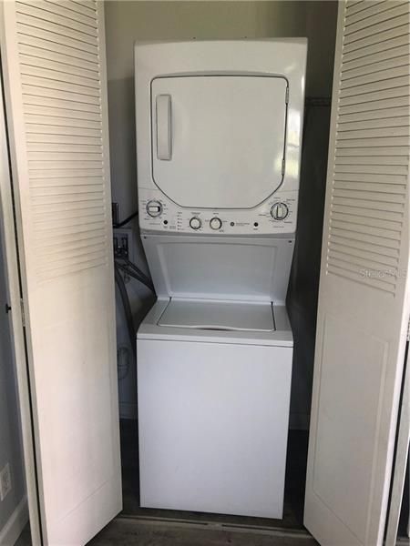 Stacked washer/dryer vented to outside