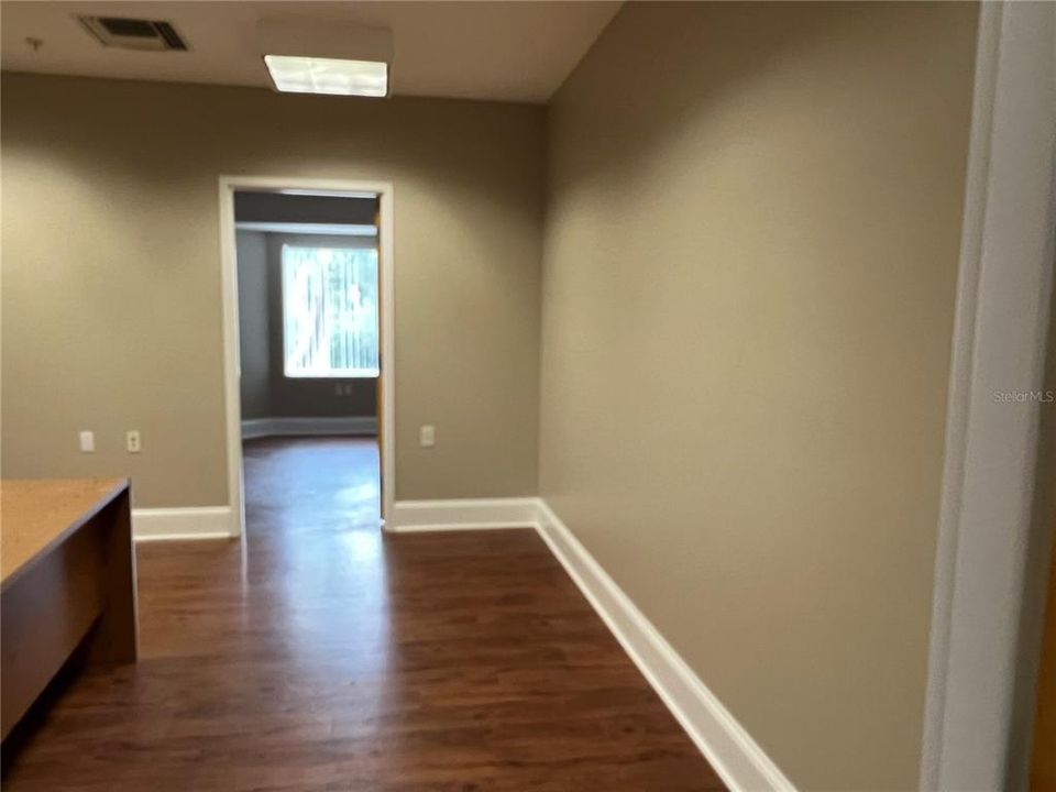 Suite 209 - Fresh paint and hardwood floors
