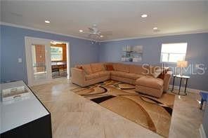 Family Room is a perfect place to for the kids or other family members to unwind. (2nd Living area) Tile flooring.
