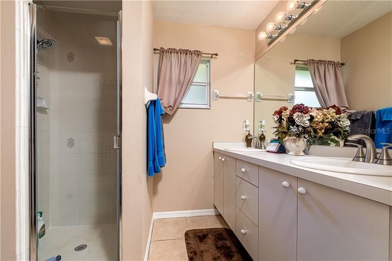 5008 23 Street East, Bradenton FL 34203 MLS A4473352Master Bath with shower, double sinks, and spacious walk in closet