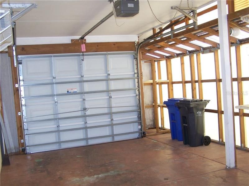 SINGLE CAR EXPANDED GARAGE w OPENER * NOTICE EXTRA SPACE FOR GARBAGE CANS