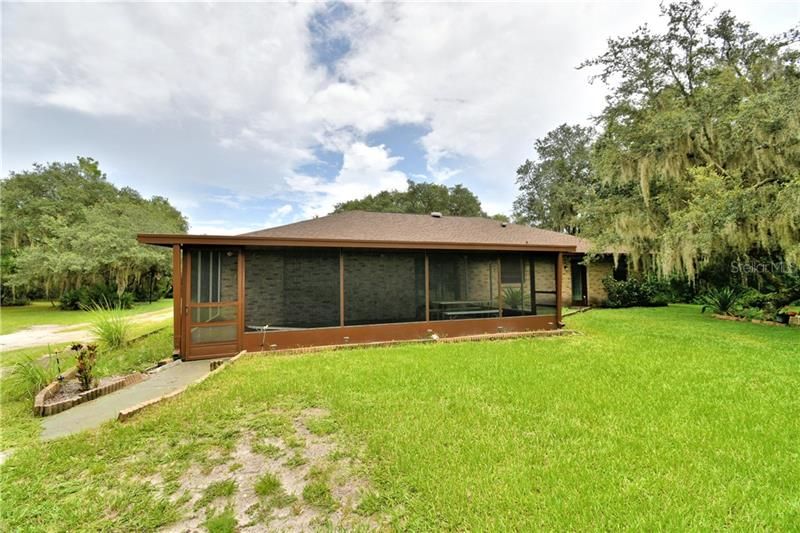 Screened back porch for entertaining