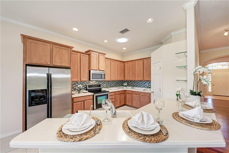 The breakfast counter allows for informal dining and entertaining