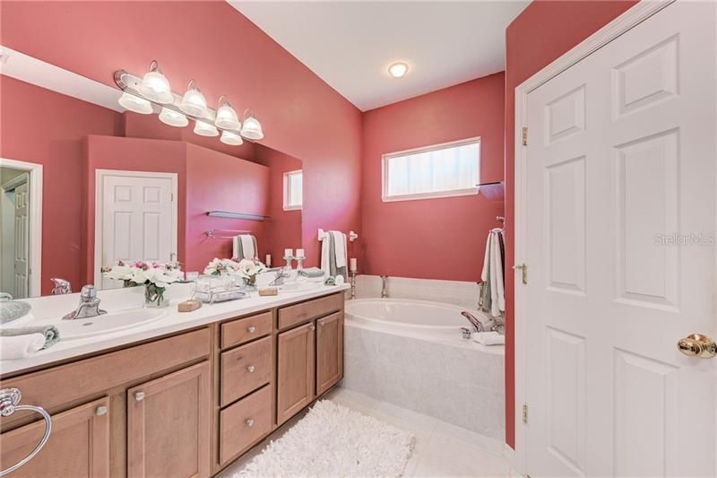 The Master Bath has a Walk in Shower and a Garden tub
