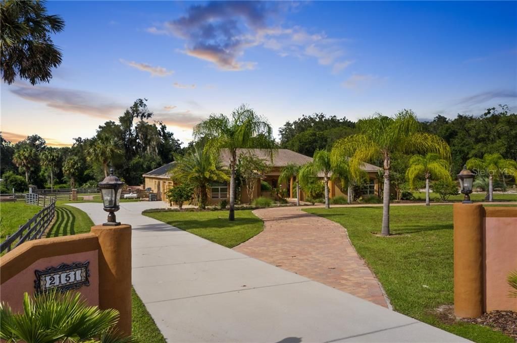 Front Entrance - Driveway leads to side entry garage, plus additional circular paver drive.