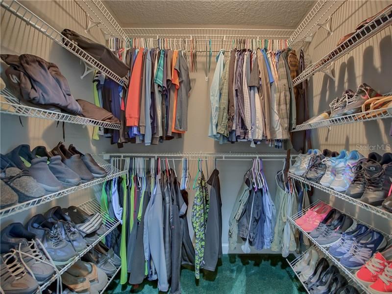 ONE OF THE WALK-IN MASTER BEDROOM CLOSETS