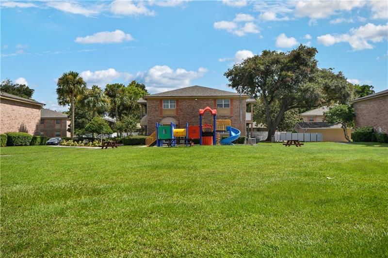 COMMUNITY PLAYGROUND, picnic areas and expansive GREEN SPACE!