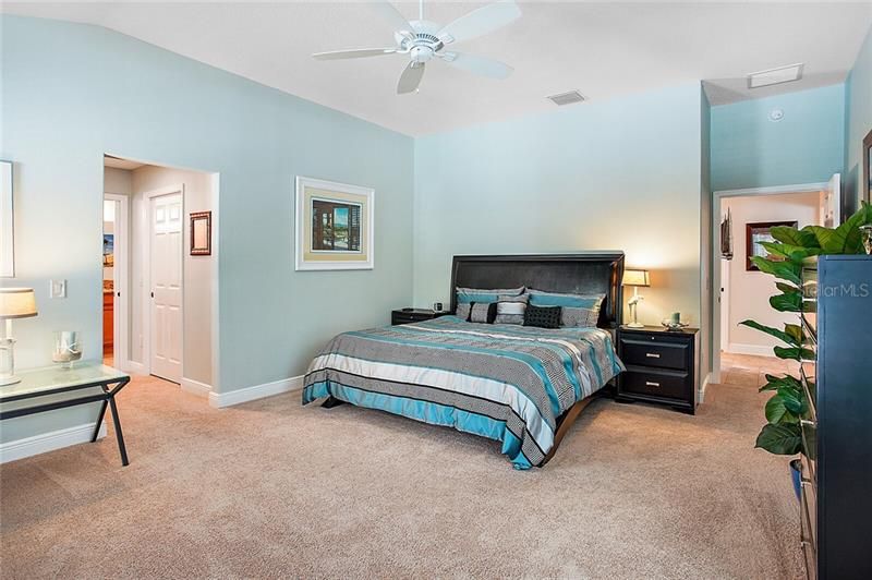 Spacious master bedroom with en suite and His & Hers walk in closets