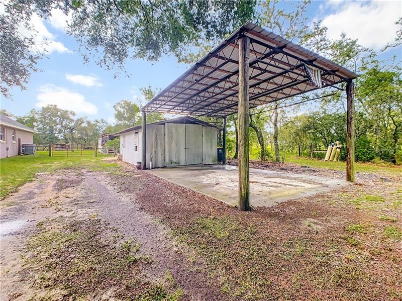 Workshop, carport, storage shed - there is plenty of room for you to convert this fit your needs.