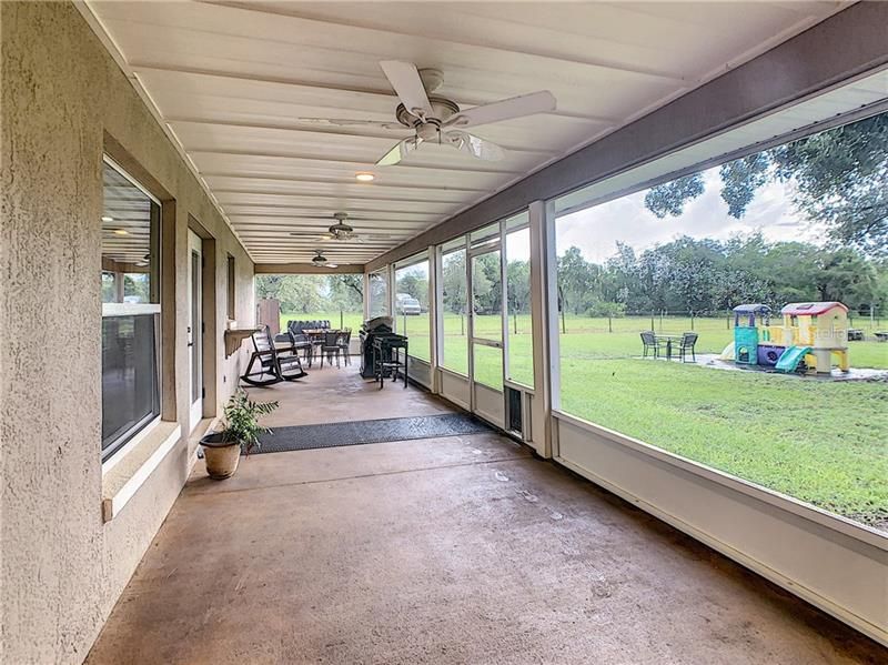 Back screened porch offers privacy and tranquility with no back yard neighbors.