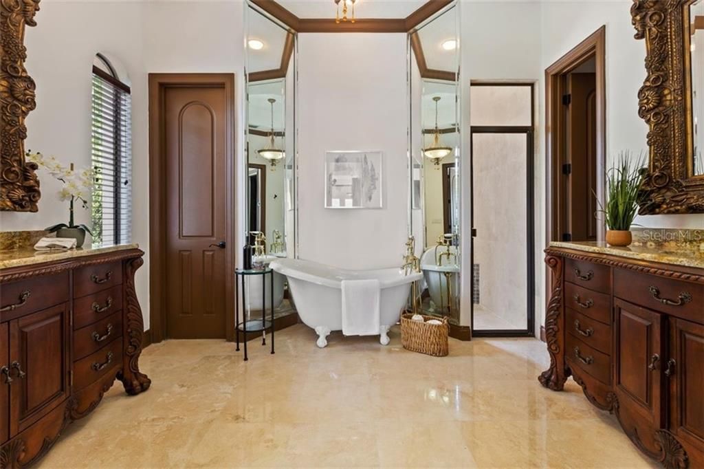 The first floor master bathroom is nothing short of astounding. It is fit for a royalty.