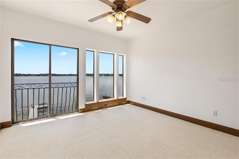 There never will be a shortage of bedrooms or bathrooms in this home. Always with a lake view. No exceptions!