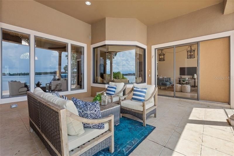 The first floor powder room is accessible both from the patio and the living room. This home has no shortage of ingenious and comfortable decisions.