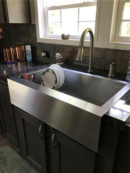 Stainless farm style kitchen sink