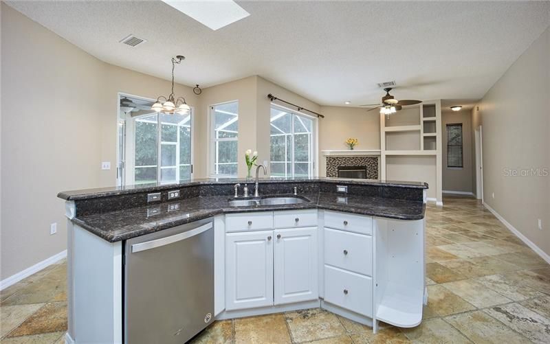 Easy to socialize with friends and family while in the kitchen with this open design!