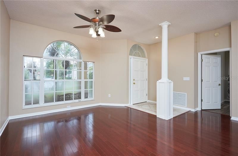 Front entrance and formal living room with lots of natural light!