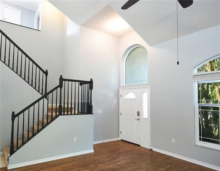 Vaulted ceilings and lots of natural light welcome you into the foyer!