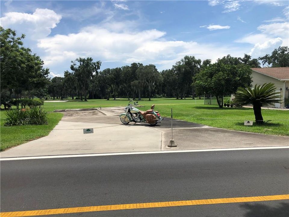 VIEW LOOKING THROUGH BUILD SITE TO FAIRWAY/ SAND TRAP (MC NOT FOR SALE - IN PIC FOR PERSPECTIVE)