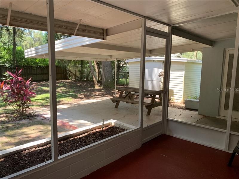 CARPORT IS IN BACKYARD